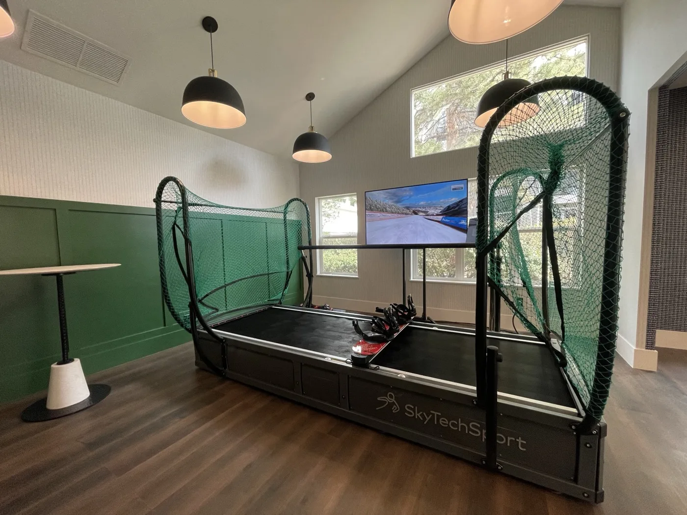 Home ski simulator installation in a bright residential room